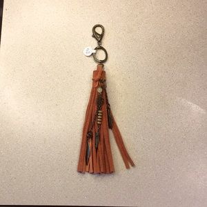 Leather tassel purse charm beads feathers rust coral pendant